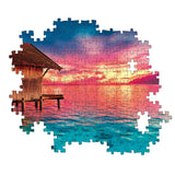 High-quality 500 piece puzzle by Clementoni featuring a serene tropical sunset and overwater hut