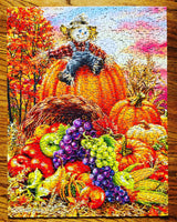 Harvest Cornucopia 500 piece puzzle by Springbok featuring a bountiful fall scene with cornucopia and scarecrow