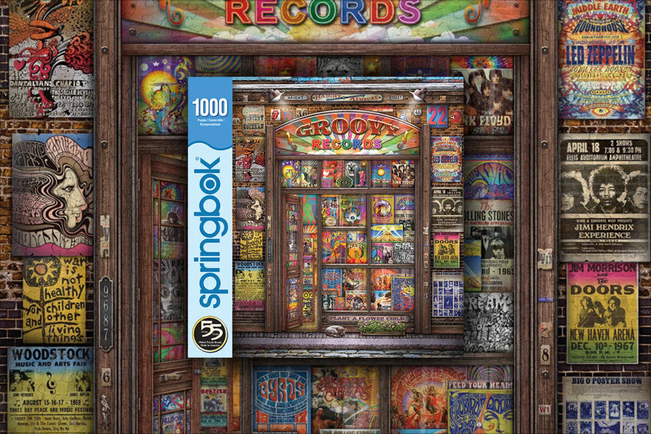 Completed Groovy Records puzzle by Springbok showcasing vibrant classic rock album covers and posters