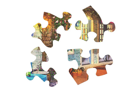 Close-up of Dolce Vita puzzle pieces from Springbok with vibrant colors and intricate Venetian details