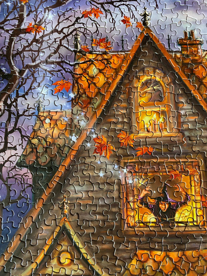 Haunted House 1000 piece puzzle featuring eerie haunted mansion under a full moon by Springbok