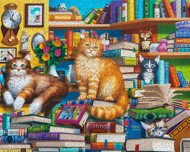 Bookshop Cats 1000 piece puzzle featuring cats nestled among books