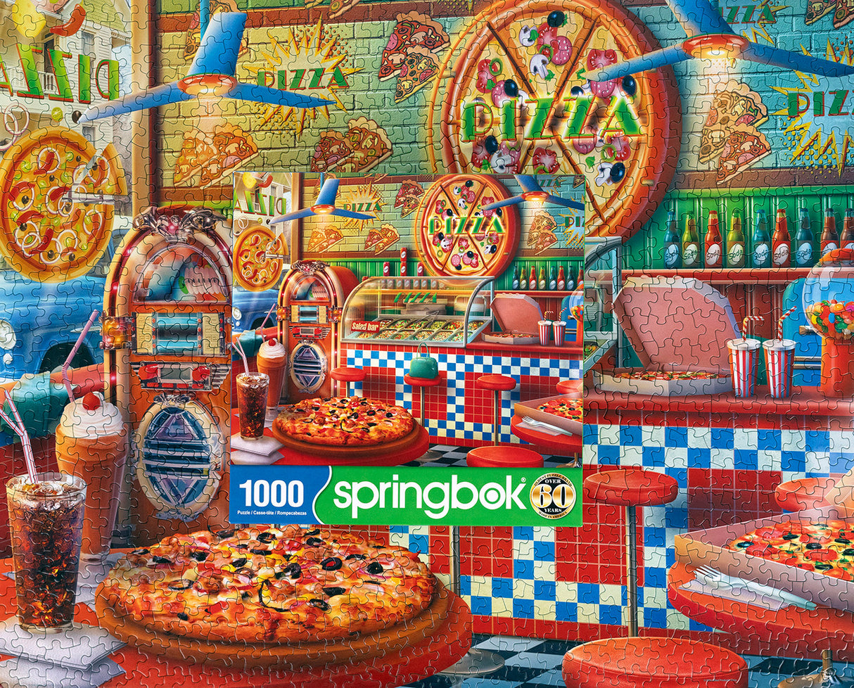 Completed puzzle and box of colorful retro-themed puzzle featuring a pizza shop with neon signs and a fully stocked salad bar