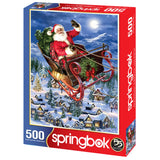 Delivering Christmas puzzle featuring Santa flying in his sleigh over a snowy village by Springbok