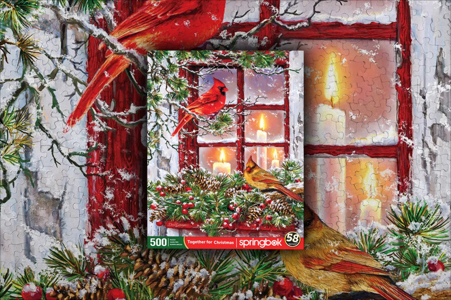 Completed Together for Christmas puzzle by Springbok showcasing festive cardinals and a cozy cabin scene