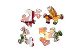 Close-up of Together for Christmas puzzle by Springbok pieces with vibrant holiday details of cardinals and garlands 