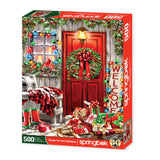 Home for the Holidays 500 piece puzzle by Springbok featuring a festive front door and Christmas lights