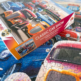 Puzzle and box from the Classic Car Show jigsaw puzzle featuring vintage cars in front of a Route 66 diner by Springbok