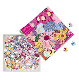 Sustainable jigsaw puzzle featuring Kate Heiss' dynamic floral artwork and eco-friendly materials