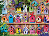 Whimsical birdhouse jigsaw puzzle with springtime colors