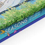 Close Up of box for Seasons by Cloudberries 1000 piece small batch puzzle.