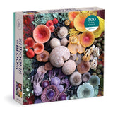 hrooms in Bloom puzzle box by Galison featuring a vibrant mushroom collage