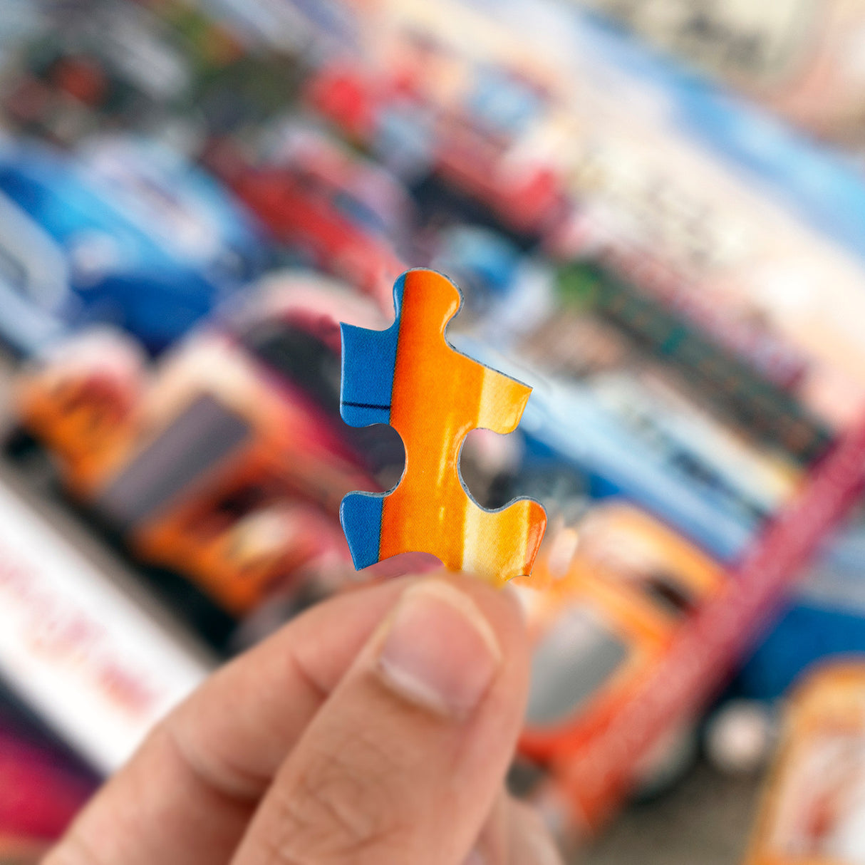 Puzzle Piece from the Springbok 1000 piece puzzle showing hot rods and classic vehicles at a retro diner and ice cream shop