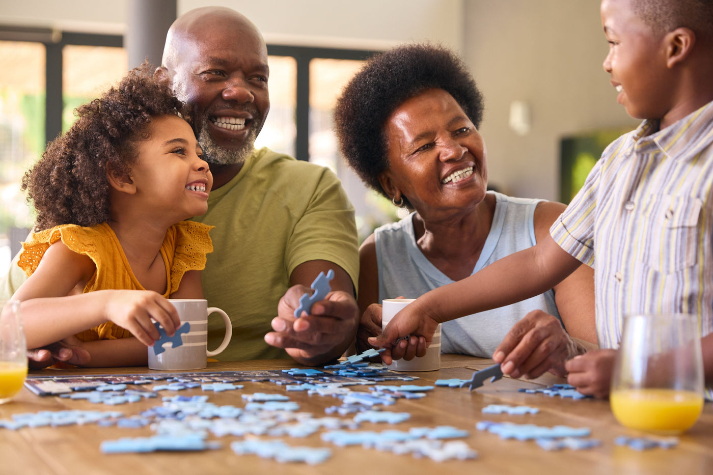 Family Puzzle time, working a puzzle with the family or friends creates connection and bonding opportunities - Puzzles for family, puzzles with friends, puzzles with community
