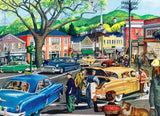 Vintage-style artwork showing a busy mid-century town scene with various General Motors vehicles and vibrant street activity by New York Puzzle Co