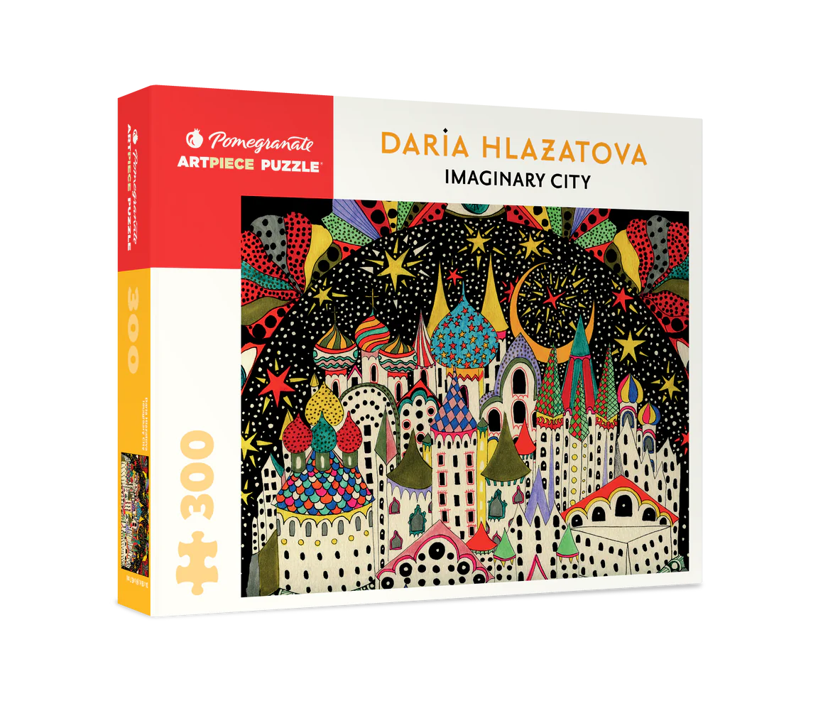 Box and finished Imaginary City puzzle showcasing Daria Hlazatova’s artwork a 300 piece puzzle by Pomegranate