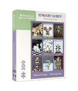 Box of finished Dancing Cats puzzle featuring Edward Gorey’s eccentric artwork by Pomegranate