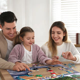 Family putting together the Boardwalk 500-piece jigsaw puzzle of Santa on a motorcycle waving to a family with a Christmas tree on their car