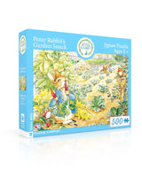 New York Puzzle Company's 500-piece Peter Rabbit's Garden Snack puzzle showcasing Peter Rabbit munching on vegetables amidst a beautifully illustrated garden with a gardener and bird nearby.