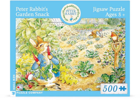 Peter Rabbit's Garden Snack 500-piece jigsaw puzzle by New York Puzzle Company featuring Peter Rabbit eating vegetables in a garden scene with vibrant plants and wildlife