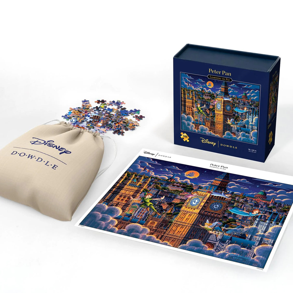 Contents of puzzle are cloth bag, color poster, and keepsake box for Peter Pan Learning to fly 500 piece jigsaw puzzle by Dowdle and Disney