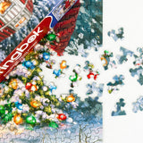 box and pieces from Snowy Retreat puzzle featuring a festive red camper with Christmas lights in a snowy forest by Springbok