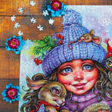 JaCaRou Winter Warmth puzzle with girl, bunny, owl, and hedgehog not completely finished