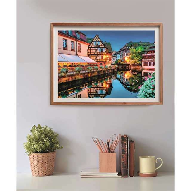 Completed Strasbourg Old Town puzzle with reflections in the canal and charming French streets 500 pieces by Clementoni