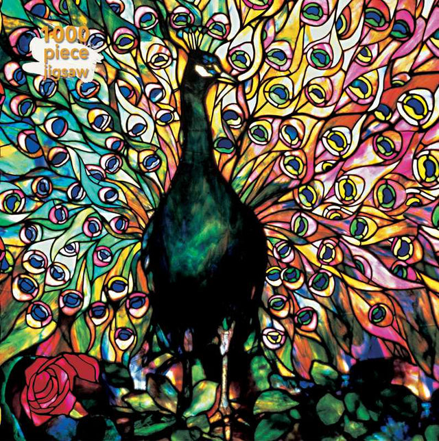 Displaying Peacock 1000 piece puzzle featuring Tiffany’s vibrant stained glass design