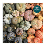 Close-up of Heirloom Pumpkins puzzle pieces with detailed pumpkin imagery by Galison 