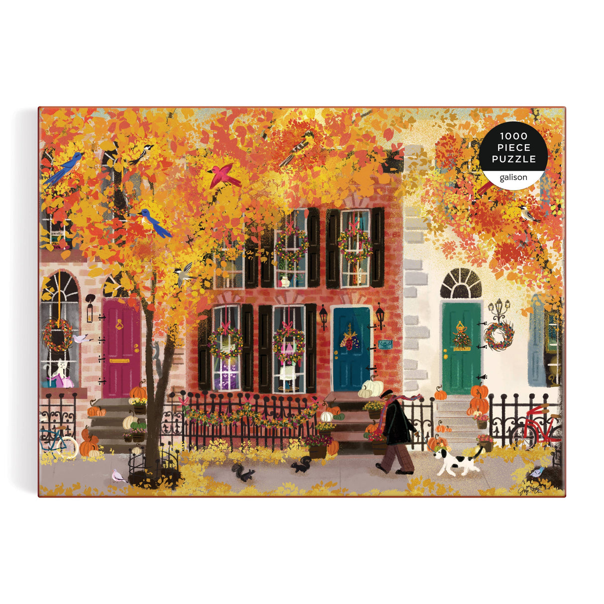 Galison puzzle box featuring a warm autumn neighborhood design