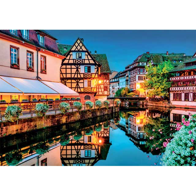 Close-up of Strasbourg Old Town puzzle pieces showcasing the detailed buildings and water reflections by Clementoni