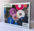 Puzzle Culture puzzles of 1000 pieces called Vinyl Colors.