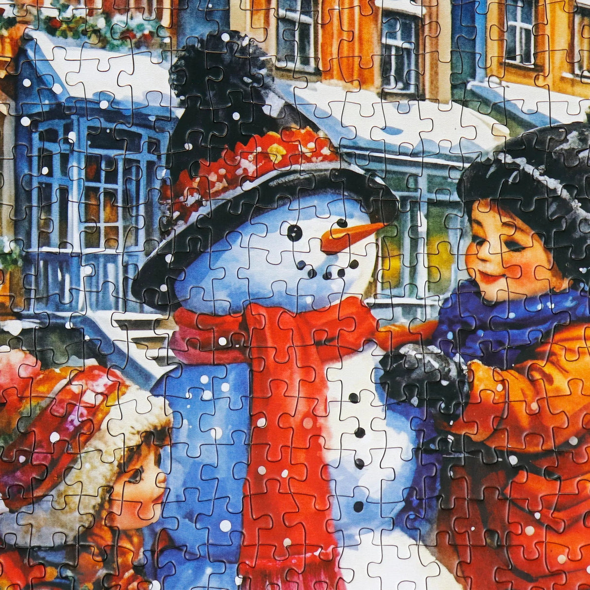 Close-up of children and snowman puzzle Winter Scene by Delfy 1000 piece puzzle